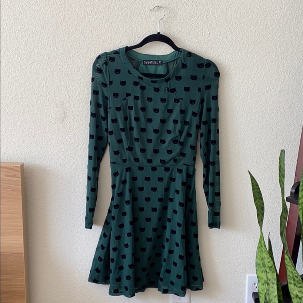 Dark green boutique cat dress size 6